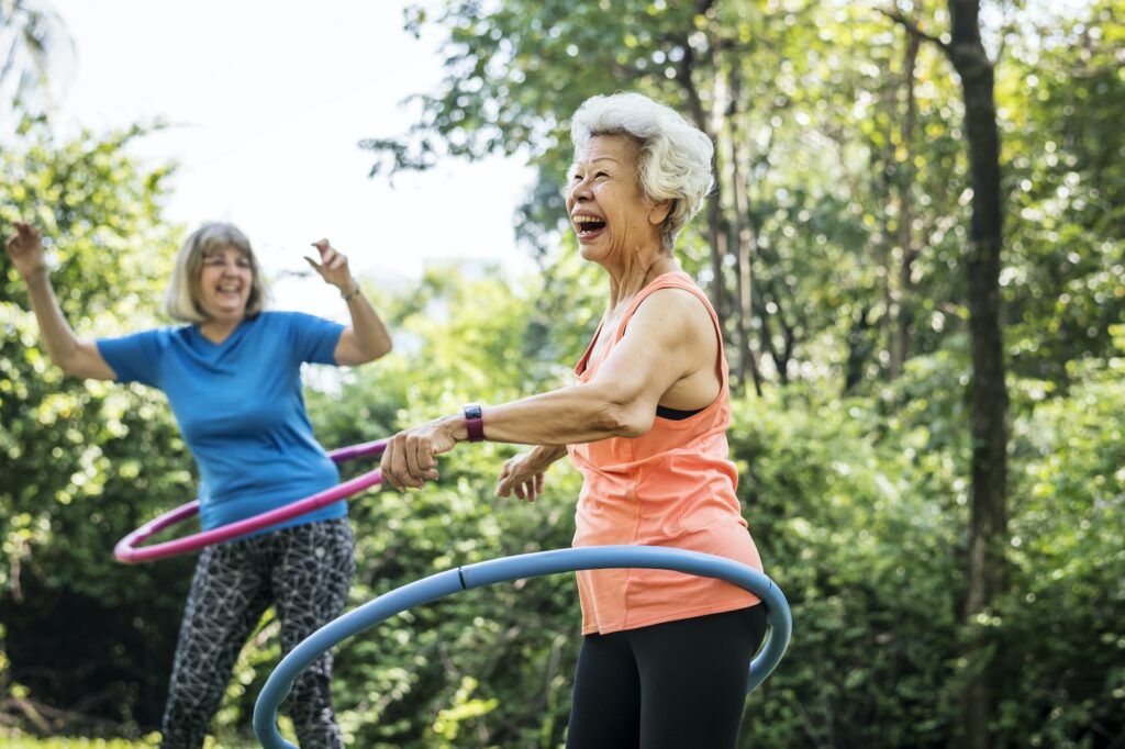 Senior Woman Exercising With A Hula Hoop